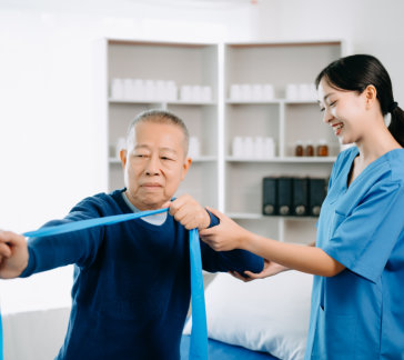 caregiver assisting her patient