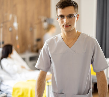 man wearing gray scrub suite